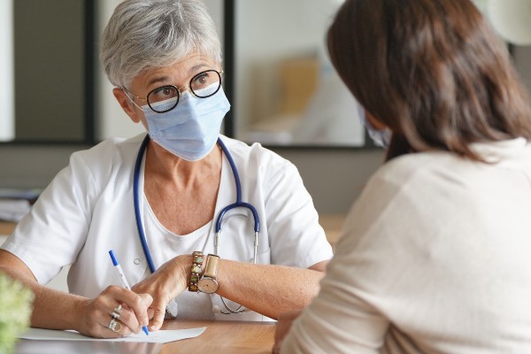 A doctor wearing a mask