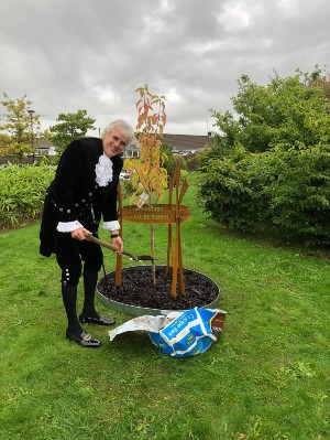 David Beeby, High Sheriff of Cumbria plants the memorial tree